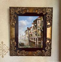 full view of framed Venice canal oil painting