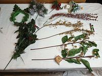 Overview of all holiday floral stems, headband and nightlight on table
