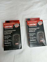 Front view of two GenieMaster 3-button remote boxes