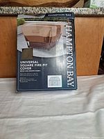 Front of box showing Hampton Bay branding, product image, dimensions and features