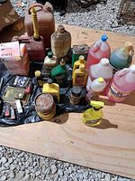 Overview of all automotive fluids, fuel cans, tins and parts on board