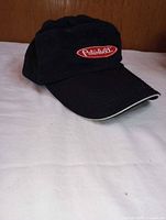 Front view showing Peterbilt logo and bill