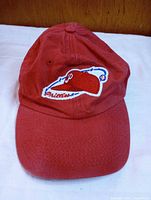 Front view showing Phillies logo patch and bill wear