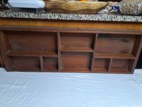 Front view showing compartments and rustic finish