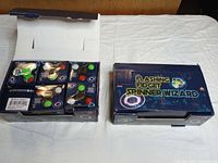 Open and closed Zupa Flashing Fidget Spinner Wizard boxes showing contents