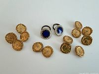 Group view showing all gold-tone and enamel buttons