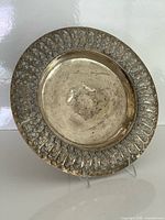 Full view of the plate showing size and ornate border