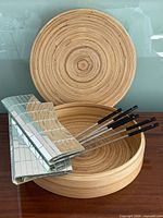 All items together: bamboo box with lid, mirrored tray, skewers