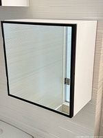 Full view of cabinet mounted on wall