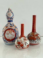 Front view of all three Imari vases