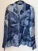 Front view of blue denim print Kenzo shirt showing pockets and buttons