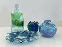 Group shot showing all four art glass pieces