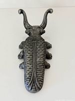 Top view of beetle-shaped cast aluminium boot jack