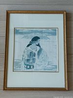 Full view of framed print showing artwork, mat, frame