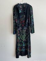 Dress and jacket front view on hanger