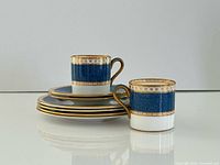 Two cups and four saucers, full lot overview