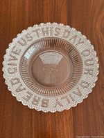Top view showing complete bowl, lettering, scalloped edge