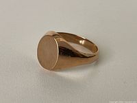 Front view of unengraved oval signet face