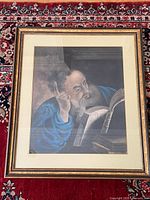Full view of framed print on rug
