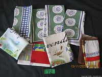 All seven linens displayed overlapping