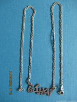 Full view of necklace showing chain style and pendant