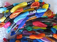 Pile of multicolor skeins showing bands and colors