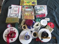 Group shot of all ribbon spools, napkin packs and small accessories