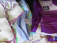 Close-up showing Echo, Liz Claiborne tag, AK Anne Klein signature