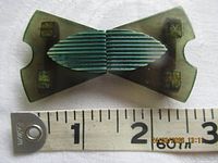 Front view showing full buckle and tape measure indicating width