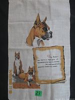 Full view of linen tea towel showing Boxer illustrations and text panel