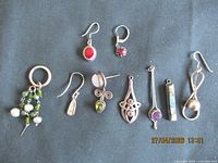 Group shot of all nine sterling silver pieces laid out