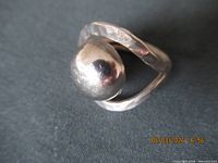 front view showing domed orb and hammered band
