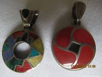 Both pendants side by side showing overall size, shape and inlay patterns
