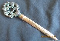 Full view showing decorative handle and blade