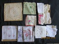 All hankies laid out showing variety and boxed pieces