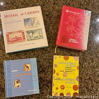 Top-down view of all four books front covers