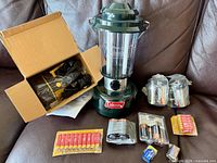 Overall view of lantern, spotlight box, accessory kit and all battery packs
