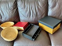 Group view of all five storage items on couch