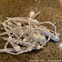 Bundle of two Gemmy Shooting Star icicle light sets with clear drops on white cord