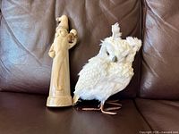 Santa and owl on brown leather background