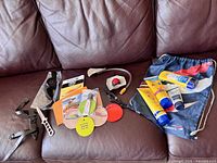 All lot components arranged on couch
