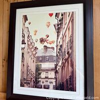Front view of framed print showing artwork, mat, and frame