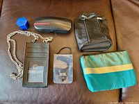 All six accessories laid out on brown surface