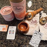 Full set showing wands, bowl, packaging, pouches, instruction cards