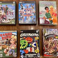 Front covers of all six PC game boxes