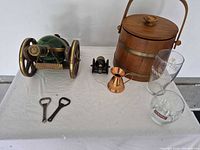 Full lot showing Cognac wagon bottles, ice bucket, measure, glasses, openers