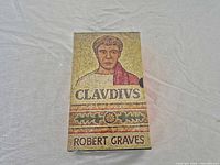Front view of sealed slipcase showing mosaic artwork and titles