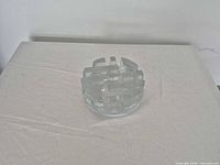 top view of round segmented clear glass tea warmer