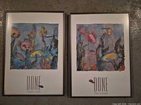 Both framed Linn Done prints side by side