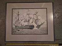 Framed print showing full image of sailing ships with mat and frame